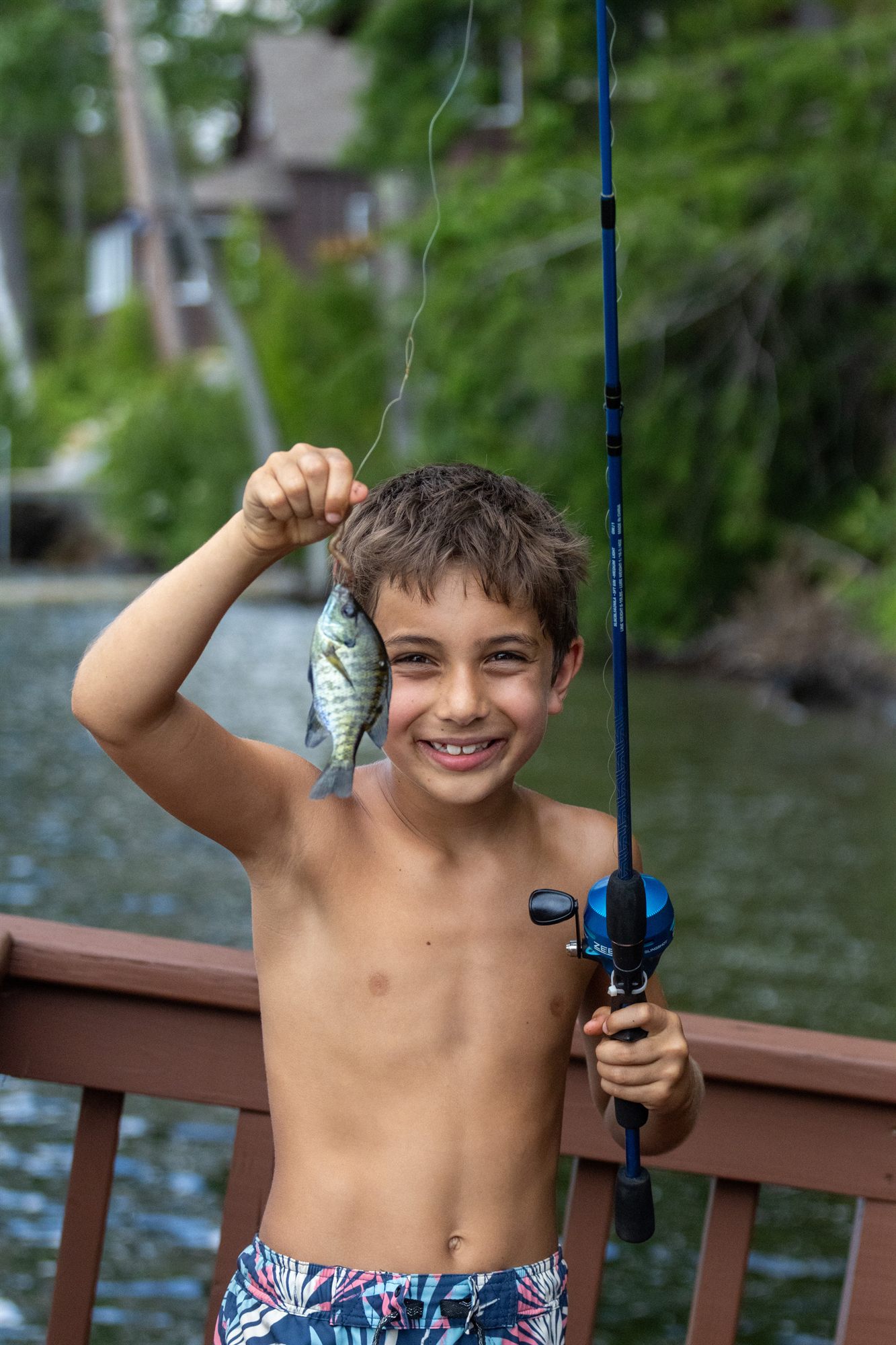 A smiling young camper at camp